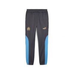 Męskie spodnie Olympique de Marseille ftblNRGY+ PUMA. Brązowe spodnie dresowe męskie Puma, bez wzorów, z dresówki. Za 284.00 zł.