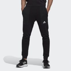 Spodnie męskie adidas Essentials BrandLove French Terry. Białe spodnie sportowe męskie Adidas, z polaru. Za 179.00 zł.