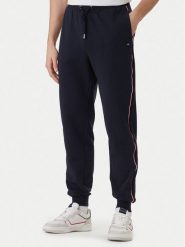 Tommy Hilfiger Spodnie dresowe Global Stripe MW0MW42882 Niebieski Regular Fit. Niebieskie spodnie dresowe męskie Tommy Hilfiger, bez wzorów, z bawełny. Za 529.99 zł.