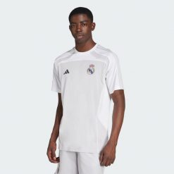 Koszulka Real Madrid UBP. Białe t-shirty sportowe męskie Adidas, xs, bez ramiączek, do piłki nożnej. Za 199.00 zł.
