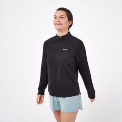 Koszulka tenisowa długi rękaw damska Artengo Thermic. Czarne bluzki sportowe damskie KUIKMA, s, bez wzorów, z elastanu, bez kołnierzyka. Za 89.99 zł.