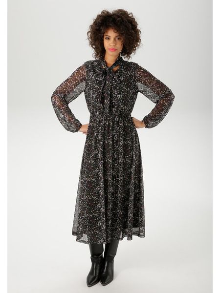 Aniston Sukienka w kolorze czarnym rozmiar: 38. Czarne sukienki damskie Aniston, bez wzorów, bez kołnierzyka, bez ramiączek, maxi. Za 95.69 zł.