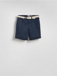 Szorty slim fit - granatowy. Niebieskie szorty męskie Reserved, z bawełny, bez kołnierzyka. Za 129.99 zł.
