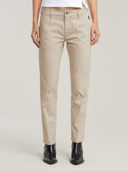 G-Star Spodnie chino w kolorze beżowym rozmiar: W31/L34. Brązowe spodnie materiałowe damskie G-Star, bez wzorów, retro. Za 178.37 zł.