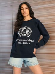 Bluza z długim rękawem - granatowy. Niebieskie bluzy bez kaptura damskie Sinsay, l. W wyprzedaży za 19.99 zł.