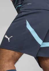 Męskie szorty RB Leipzig PUMA Dark Night Hero Blue. Niebieskie szorty męskie Puma, na jesień, bez wzorów, z materiału, klasyczne. Za 191.20 zł.