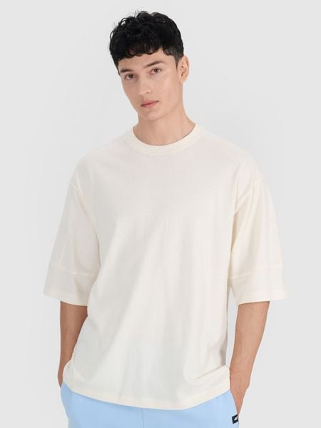 4F T-shirt oversize gładki męski - biały XL. Białe t-shirty męskie 4f, m, bez wzorów, z bawełny, bez kołnierzyka. W wyprzedaży za 39.99 zł.
