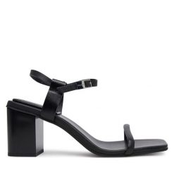 Sandały Calvin Klein. Czarne sandały damskie CALVIN KLEIN, bez wzorów, bez obcasa, na słupku. Za 349.99 zł.