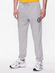 New Balance Spodnie dresowe MP31902 Szary Regular Fit. Szare spodnie dresowe męskie New Balance, bez wzorów, z dresówki. Za 139.99 zł.