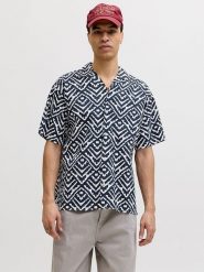 Jack & Jones Koszula "Milo" - Loose fit - w kolorze granatowym rozmiar: L. Niebieskie koszule męskie Jack & Jones, l, bez wzorów, z bawełny, bez kołnierzyka, bez ramiączek. Za 104.95 zł.
