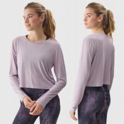LONGSLEEVE DAMSKI 4F CROP-TOP DO JOG BLUZA Z DODATKIEM MODALU KOLOR FIOLETOWY. Fioletowe bluzy bez kaptura damskie 4f, l, bez wzorów, z materiału, bez ramiączek, bez kaptura. Za 79.99 zł.