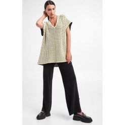 Tunika WOLFORD. Tuniki damskie Wolford, s, bez wzorów, bez kołnierzyka, bez ramiączek. W wyprzedaży za 1,164.87 zł.