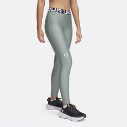 Legginsy treningowe damskie Under Armour HeatGear. Zielone legginsy damskie Under Armour, xs, bez wzorów, na fitness i siłownię. Za 109.99 zł.