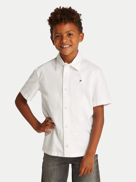 Tommy Hilfiger Koszula KB0KB09554 S Biały Regular Fit. Białe koszule chłopięce Tommy Hilfiger, bez wzorów, z bawełny, bez kołnierzyka, bez ramiączek. Za 209.99 zł.