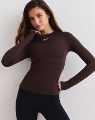 Damski top z długim rękawem ultramiękki, szybkoschnący Soft Basic brązowy. Brązowe topy sportowe damskie Aim'n, xl, bez wzorów, z dzianiny, bez ramiączek. Za 151.00 zł.