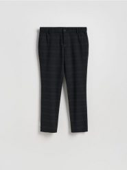Spodnie chino slim w kratę - czarny. Czarne spodnie materiałowe męskie Reserved, bez wzorów, z tkaniny. Za 159.99 zł.