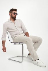 AERONAUTICA MILITARE Granatowe spodnie bojówki Iconic Anti-G. Niebieskie spodnie materiałowe męskie AERONAUTICA MILITARE, bez wzorów, z bawełny. W wyprzedaży za 899.99 zł.