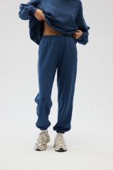 Spodnie typu jogger z HAFTEM w kolorze NAVY BLUE - NEVIS-XS. Niebieskie spodnie materiałowe damskie Marsala, bez wzorów, z bawełny, eleganckie. Za 279.90 zł.
