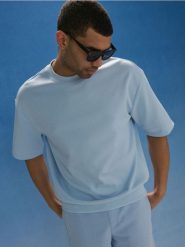 Bawełniana bluza z krótkim rękawem - błękitny. Niebieskie bluzy bez kaptura męskie Sinsay, l, z bawełny. Za 49.99 zł.