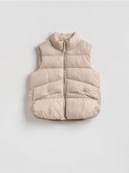 Pikowana kamizelka - kremowy. Białe kamizelki damskie Reserved, l, z tkaniny. Za 139.99 zł.