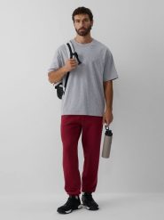 4F Spodnie dresowe joggery męskie - burgundowe 4XL. Czerwone spodnie dresowe męskie 4f, bez wzorów, z dresówki. Za 149.99 zł.