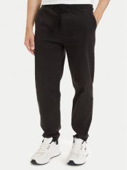 Tommy Jeans Spodnie dresowe TJM DM0DM23122 Czarny Regular Fit. Czarne spodnie dresowe męskie Tommy Jeans, bez wzorów, z bawełny. Za 409.99 zł.
