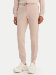 Guess Spodnie dresowe V2YB18 K7UW2 Beżowy Regular Fit. Brązowe spodnie dresowe damskie Guess, xl, z aplikacjami, z dresówki. Za 369.99 zł.