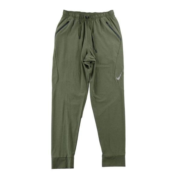 Second life - Spodnie dresowe męskie Tech Woven Pant Kaki - Stan dobry. Zielone spodnie sportowe męskie Nike, z dresówki. Za 143.46 zł.