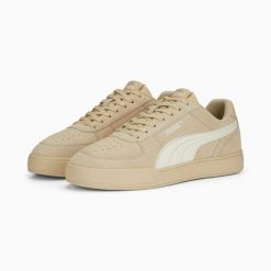 Buty sportowe unisex Puma CAVEN beżowe 39193902 r 46. Brązowe buty sportowe na co dzień męskie Puma, ze skóry, bez zapięcia, do koszykówki. Za 184.03 zł.
