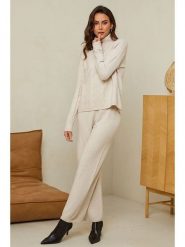Soft Cashmere Spodnie w kolorze beżowym rozmiar: 38/40. Brązowe spodnie materiałowe damskie Soft Cashmere, bez wzorów, z kaszmiru. Za 130.99 zł.