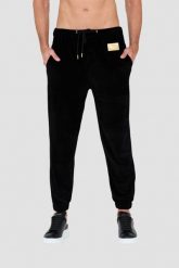 MOSCHINO Czarne welurowe spodnie dresowe. Czarne spodnie dresowe męskie MOSCHINO, bez wzorów, z dresówki. W wyprzedaży za 599.99 zł.