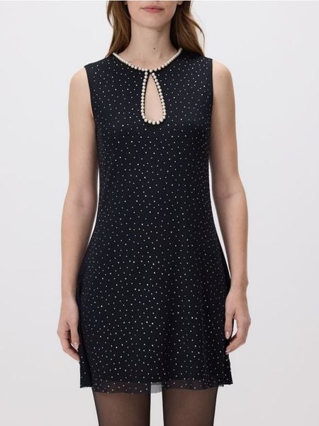 Sukienka mini z ozdobnymi detalami - czarny. Czarne sukienki damskie Reserved, l, bez wzorów, z dzianiny, bez kołnierzyka, bez ramiączek, mini, rozkloszowane. Za 129.99 zł.