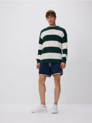 Ażurowy sweter w paski - wielobarwny. Swetry męskie Reserved, l, w ażurowe wzory, z bawełny, bez kołnierzyka. Za 129.99 zł.
