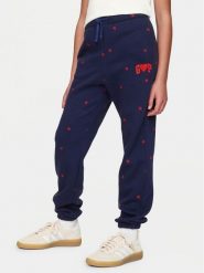 Gap Spodnie dresowe 645537-00 Granatowy Regular Fit. Niebieskie spodnie dziewczęce GAP, z bawełny. Za 99.99 zł.