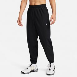 Spodnie treningowe męskie Nike FB7497010BLACKBLACK. Czarne spodnie sportowe męskie Nike, z dresówki. Za 419.99 zł.