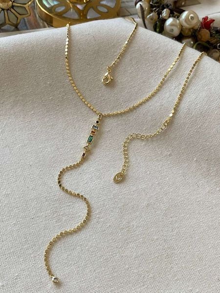 Luseera Pozłacany naszyjnik z kryształami - dł. 45 cm rozmiar: onesize. Żółte naszyjniki damskie Luseera, pozłacane. Za 43.99 zł.