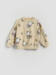 Bawełniana bluza Pochacco - beżowy. Brązowe bluzy i bluzki niemowlęce Reserved, bez wzorów, z bawełny, bez ramiączek, bez kaptura. Za 49.99 zł.
