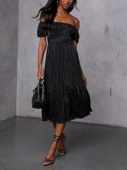 Milan Kiss Sukienka w kolorze czarnym rozmiar: XL. Czarne sukienki damskie Milan Kiss, xl, bez wzorów, z wiskozy, bez kołnierzyka, bez ramiączek, midi. Za 165.99 zł.