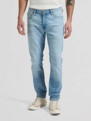 MESKIE SPODNIE LEE LUKE BLUE TIDE 112376383. Niebieskie spodnie materiałowe męskie Lee, bez wzorów, z jeansu. Za 219.99 zł.