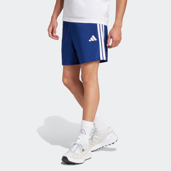 Spodenki fitness męskie ADIDAS. Niebieskie szorty męskie Adidas, bez wzorów, z materiału, sportowe. Za 119.99 zł.