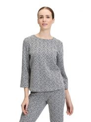 CARTOON Bluzka w kolorze biało-granatowym rozmiar: 42. Białe bluzki damskie Cartoon, bez wzorów, bez kołnierzyka, bez ramiączek. Za 97.28 zł.