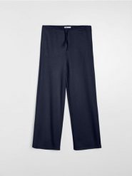 Spodnie dresowe wide leg - granatowy. Niebieskie spodnie sportowe damskie Sinsay, l, z dresówki, na fitness i siłownię. Za 39.99 zł.