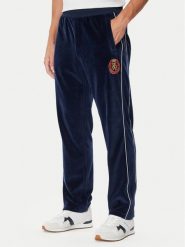 Tommy Hilfiger Spodnie dresowe Gift Crest MW0MW45207 Granatowy Regular Fit. Niebieskie spodnie dresowe męskie Tommy Hilfiger, bez wzorów, z bawełny. Za 649.99 zł.