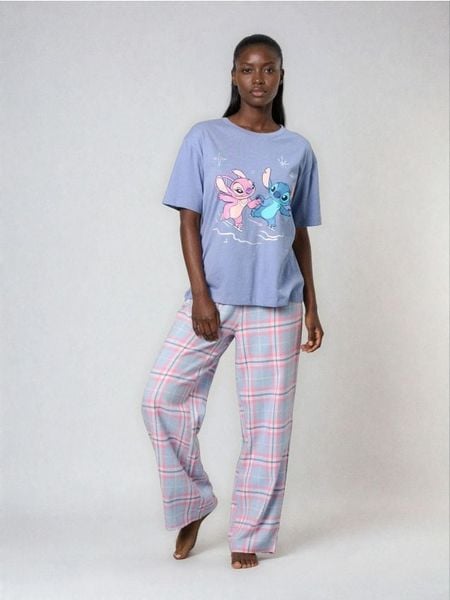 Bawełniana piżama dwuczęściowa z nadrukiem Stitch - błękitny. Niebieskie piżamy damskie Sinsay, l, bez wzorów, z bawełny, bez ramiączek. Za 69.99 zł.