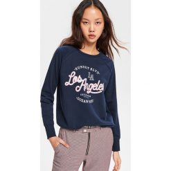 Bluza z nadrukiem - Granatowy. Niebieskie bluzy bez kaptura damskie Reserved, l. Za 139.99 zł.