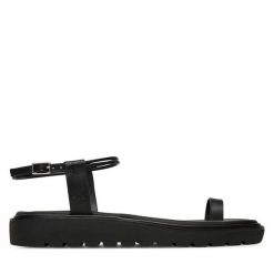 Sandały Calvin Klein Jeans. Czarne sandały damskie Calvin Klein Jeans, bez wzorów, z jeansu, bez obcasa, na płaskiej podeszwie. Za 239.99 zł.