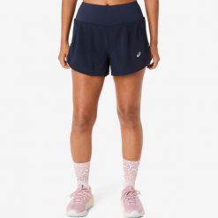 Spodenki do biegania damskie ASICS. Niebieskie szorty damskie Asics, bez wzorów, z materiału, sportowe. Za 199.99 zł.