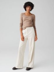 OPUS Spodnie sztruksowe "Mileni" w kolorze białym rozmiar: 44. Białe spodnie materiałowe damskie Opus, bez wzorów, ze sztruksu, z podwyższonym stanem. Za 130.99 zł.