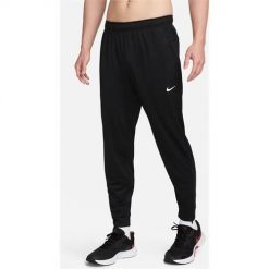 Spodnie sportowe damskie Nike Totality. Czarne spodnie dresowe damskie Nike, l, z dresówki. Za 397.00 zł.