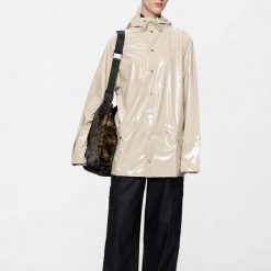Kurtka RAINS JACKET W3 Jasnobrązowy. Brązowe kurtki damskie Rains, xs, bez wzorów, z syntetyku, bez kaptura. Za 212.99 zł.